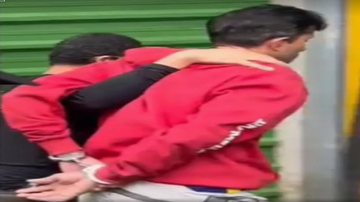 Suspeito detido por policiais - Imagem: Divulgação / Polícia Civil