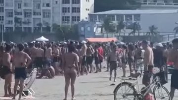 Banhistas inquietos durante arrastão em praia de São Vicente. Autoridades cobram aumento temporário do efetivo - Imagem: Reprodução