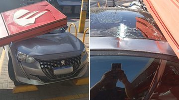 Fortes ventos derrubam placa de banco em cima de carro, em Bertioga