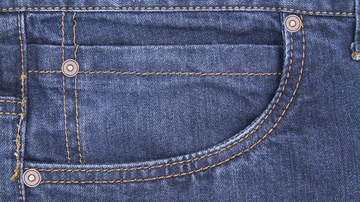 Rebite e bolso pequeno da calça jeans