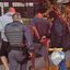 Os três acusados de manter um esquema de entrega de drogas em domicílio são conduzidos à delegacia de Ilhabela - Polícia Civil