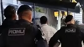 Foto de GCM e suspeitos