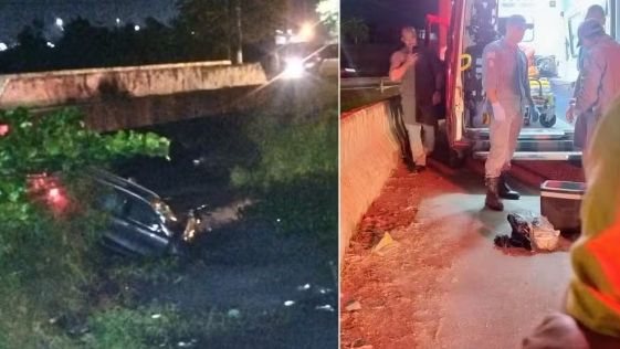 carro caído dentro canal e ao lado bombeiros se preparando para o resgate