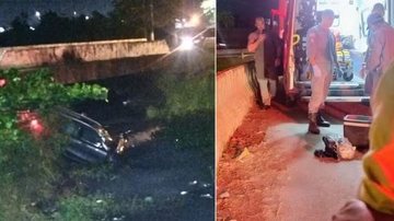 carro caído dentro canal e ao lado bombeiros se preparando para o resgate