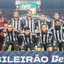 Imagem de jogadores do Santos posando para foto