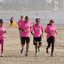 Foto de atleta correndo na areia