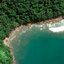 Vista aérea da Praia da Taquara, em Ubatuba, cercada pela Mata Atlântica