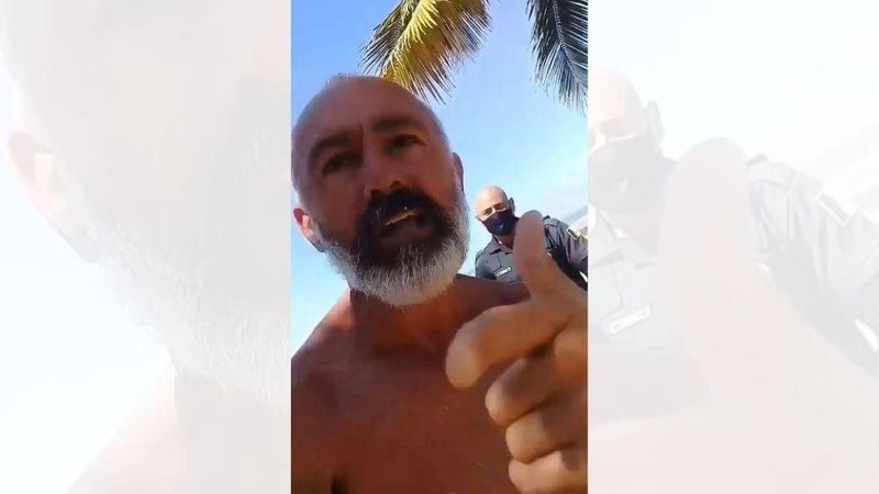 Ambulante sem máscara em ciclovia grita com GCM em Praia Grande: "Só saio daqui na agressão" - Reprodução/PGinfomidia