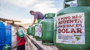 Gás à preço justo no litoral paulista  Imagem de um botijão de gás com os dizeres: "O povo não aguenta mais gás em dolar" - Divulgação