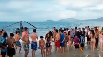 Aeronave usada em passeios caiu na praia de Canasvieiras, em Florianópolis Queda de helicóptero na praia - Divulgação: Guarda Municipal
