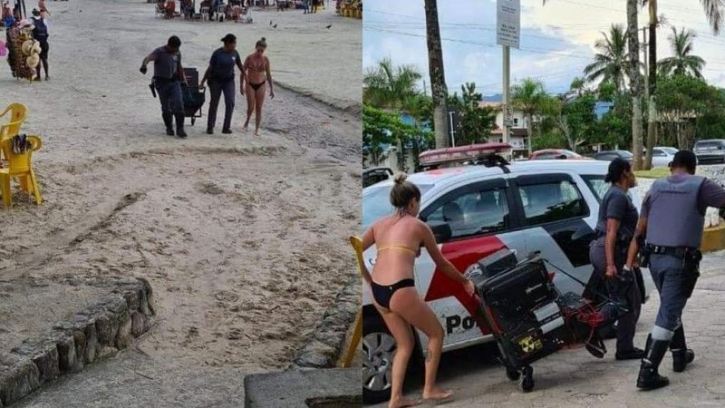 Lei do silêncio segue dividindo opinições em Ubatuba Capa - Lei do silêncio em Ubatuba completa um ano e segue dividindo opiniões Mulher na praia tendo som apreendido por policiais - Imagem: Reprodução / Kauai Ubatuba