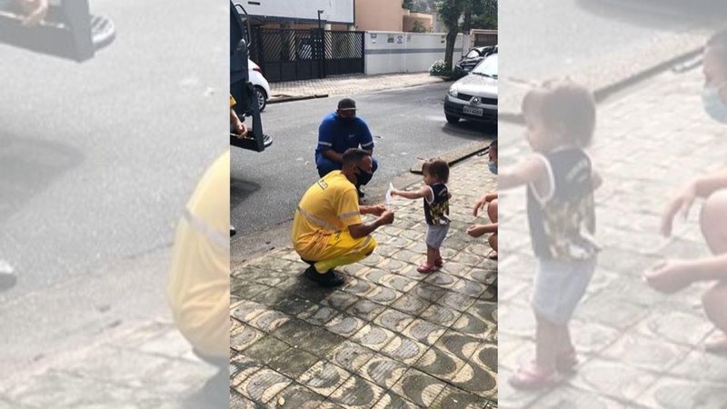 Laurinha não queria entregar a caixinha de Natal Menina viraliza ao negar caixinha para coletores de lixo menina puxando envelope da mão do coletor de lixo - Reprodução/Viver em Santos
