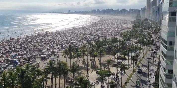Orla na cidade de Praia Grande ficou lotada neste domingo ORLA DA PRAIA GRANDE/SP Faixa de areia lotada de pessoas na Praia Grande/SP - Foto: Valerio De Almeida