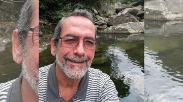 Jornalista tinha 62 anos e trabalhava atualmente como secretário de comunicação da prefeitura de Guarujá Valdir Dias Homem sorrindo na frente de uma cachoeira e com óculos de grau - Reprodução