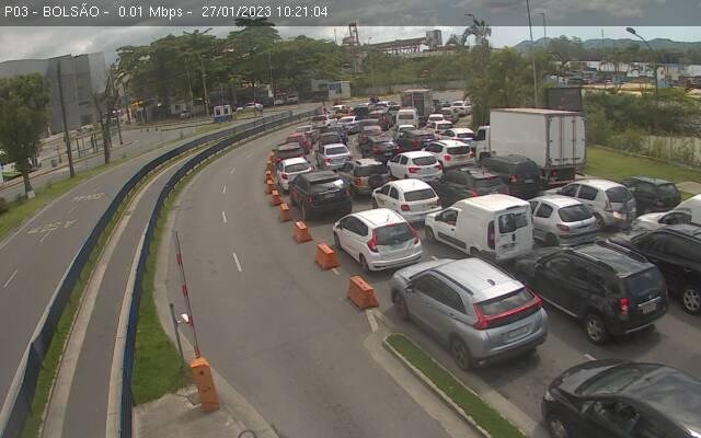 Travessia Santos-Guarujá, lado de Santos Balsa Santos-Guarujá Carros na fila de espera da balsa - Departamento Hidroviário