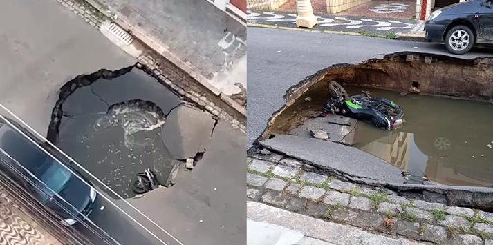Motociclista teria se acidentado após cair no buraco Cratera em rua de Santos - Reprodução