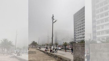 O fenômeno conhecido como "neblina de mar" atinge a cidade durante o inverno Chuvas, neblinas, ventos de noroeste: conheça melhor como é o clima em Praia Grande Neblina toma conta da orla do bairro Boqueirão, em Praia Grande - Esther Zancan