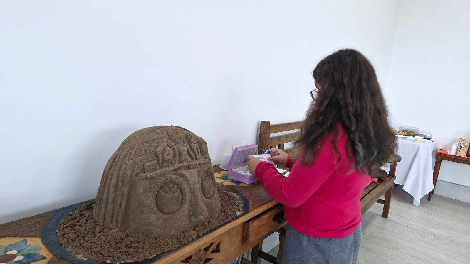Produção da escultura de areia