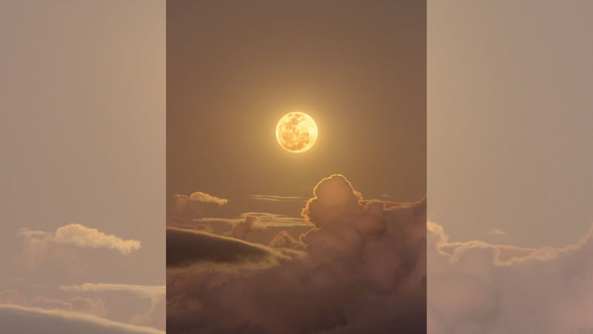 Lua com nuvens iridescente